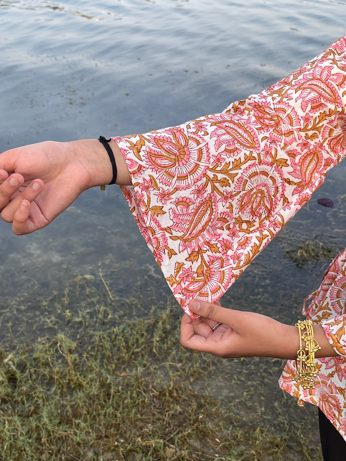 Women's peach printed kurti with bell sleeves