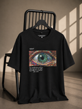 Black oversized French Terry cotton T-shirt featuring a psychedelic eye graphic with an inspirational quote on the front.
