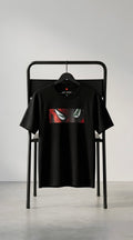 Black oversized T-shirt featuring a minimal rectangular split-face graphic on premium French Terry cotton.