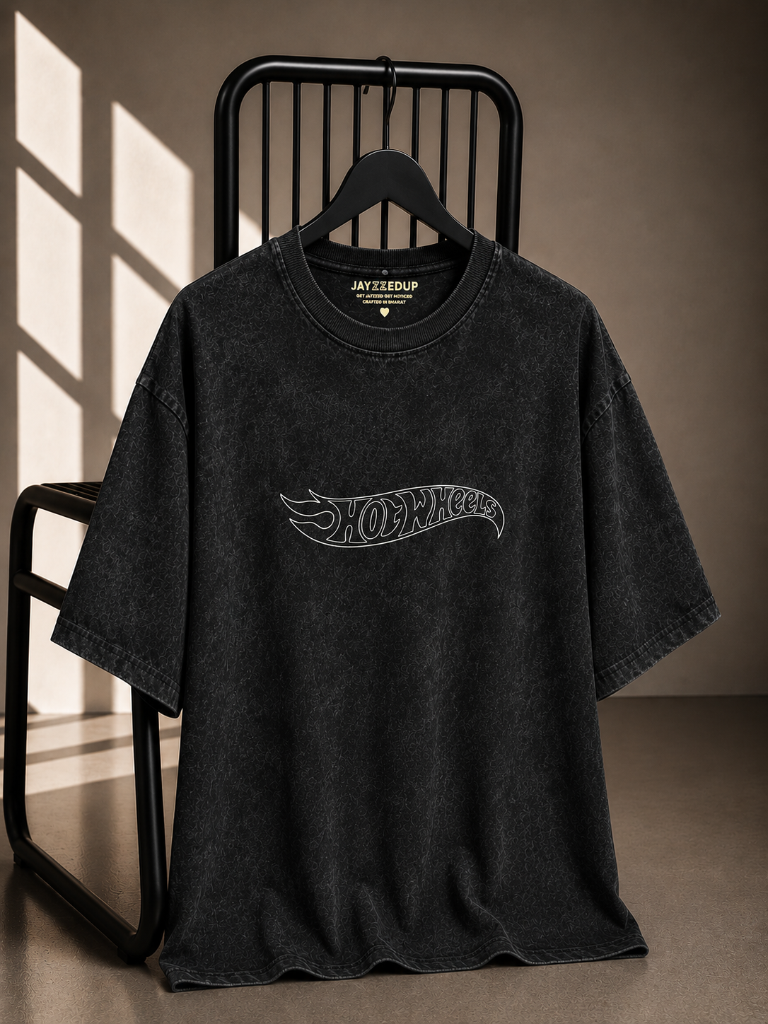 Charcoal vintage wash oversized unisex graphic T-shirt featuring a minimalist Hot Wheels chest logo on premium 220–240 GSM French Terry cotton.