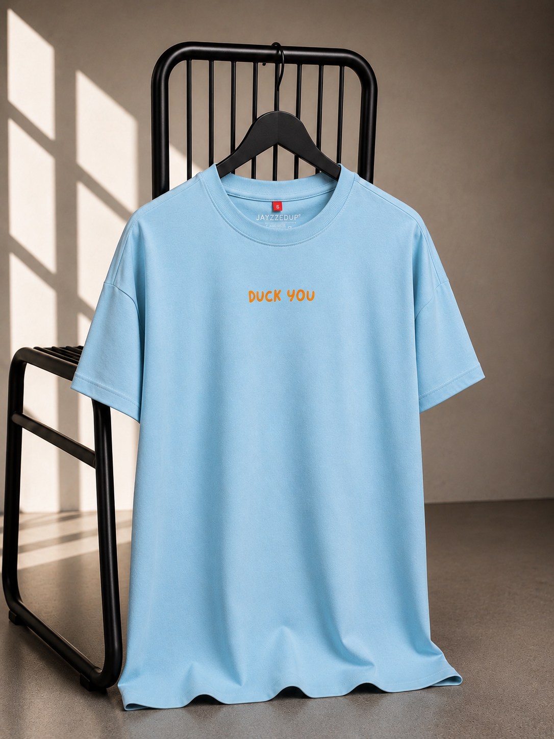 Duck You oversized sky blue unisex graphic T-shirt with minimal front typography, made from 220–240 GSM bio-washed French Terry cotton.
