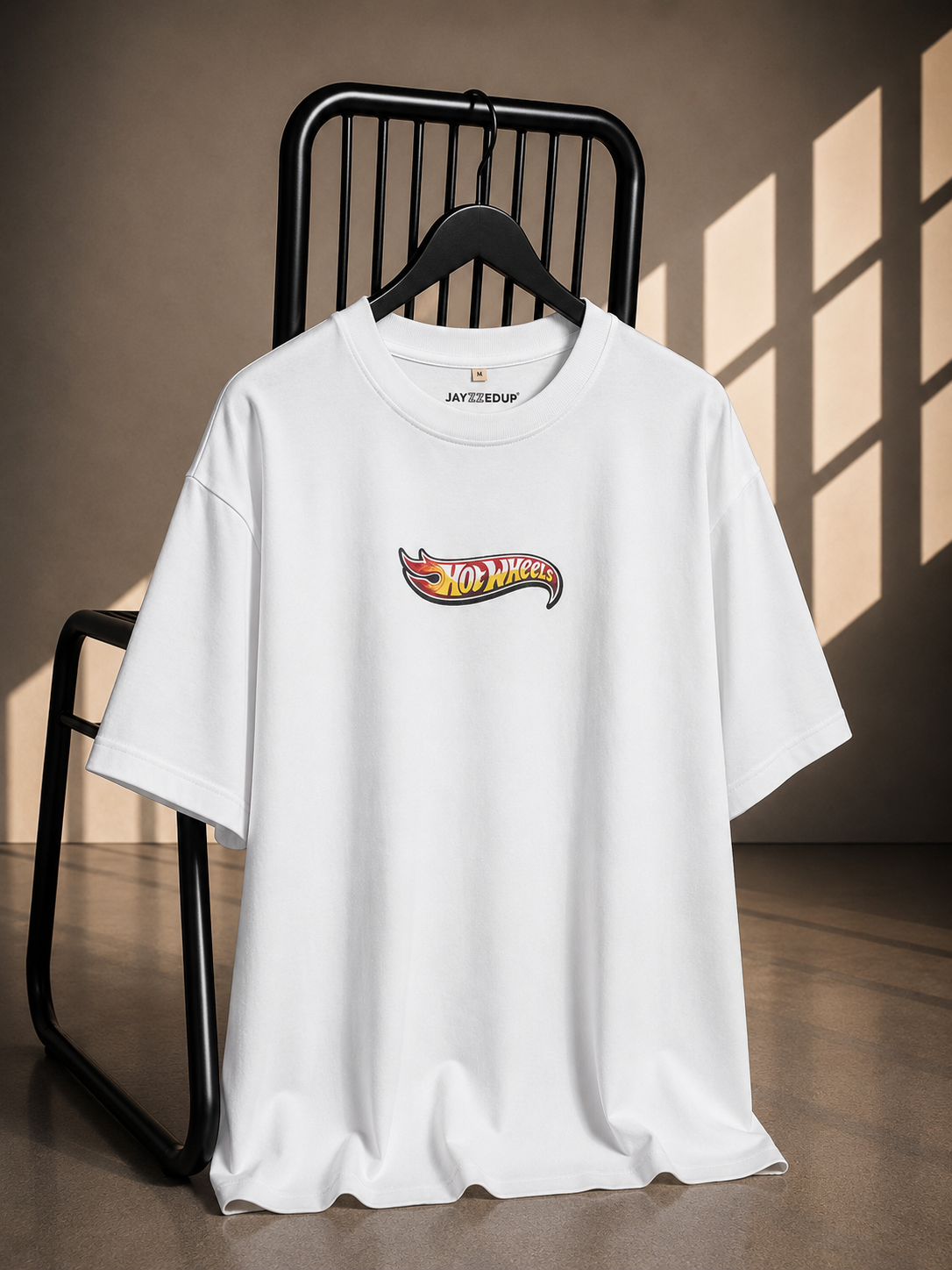 White oversized French Terry cotton T-shirt with Hot Wheels logo print on the front.
