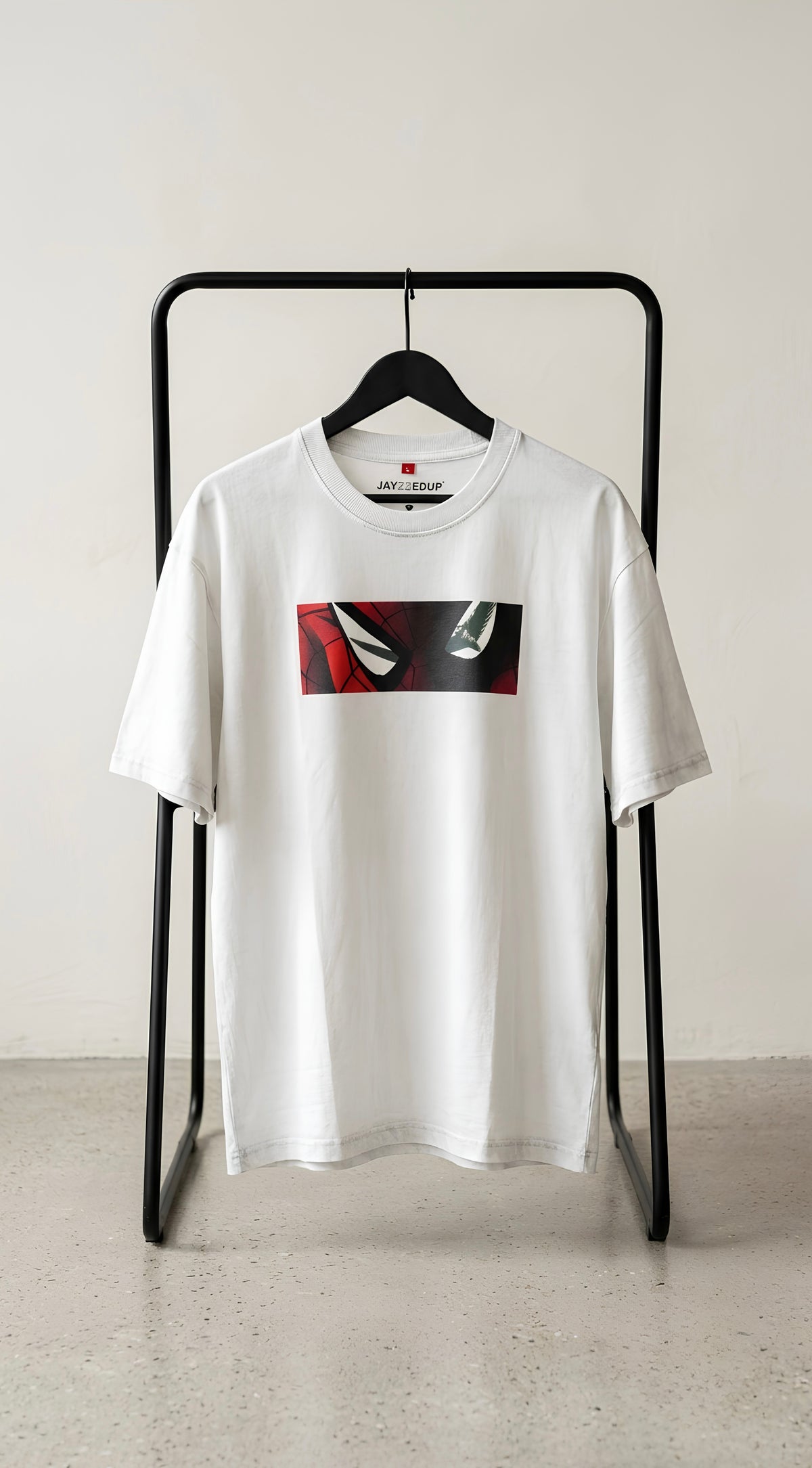 White oversized T-shirt featuring a modern split-face graphic with minimalist streetwear styling.