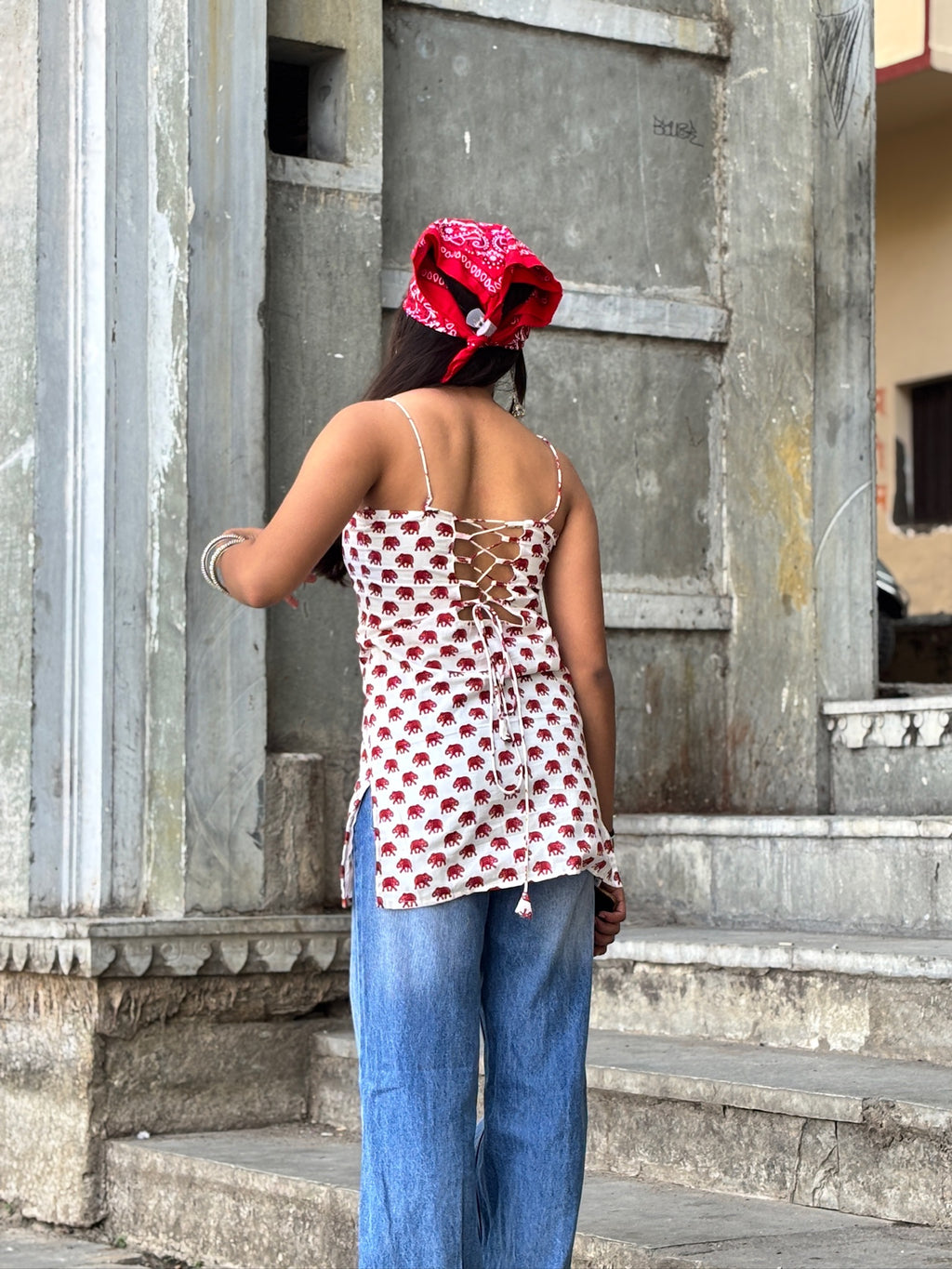 Raspberry elephant print sleeveless top for women